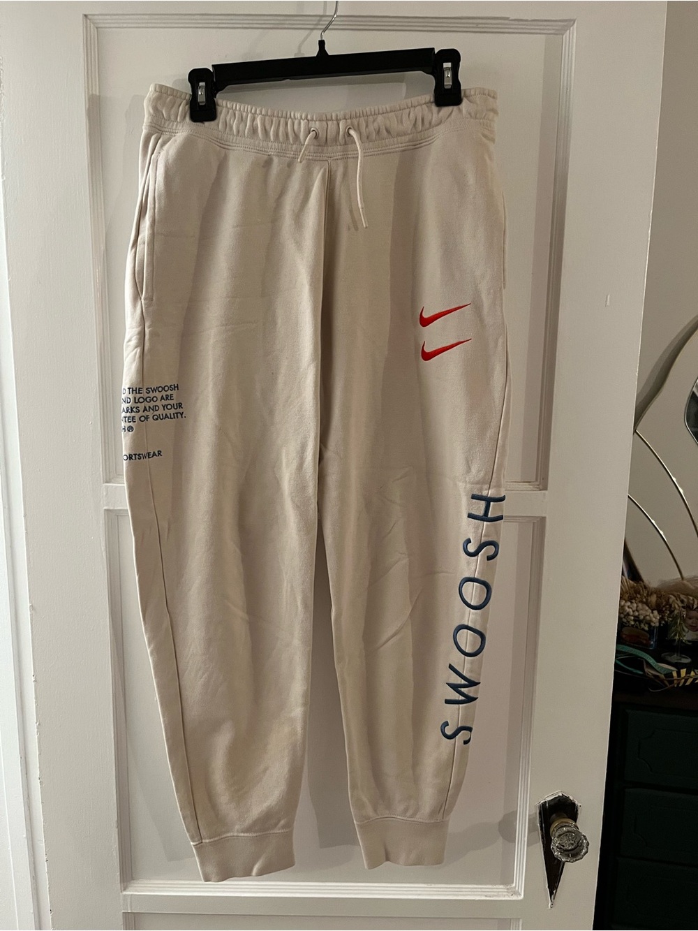 Nike Cream Sweatpants with Navy Blue Text Print